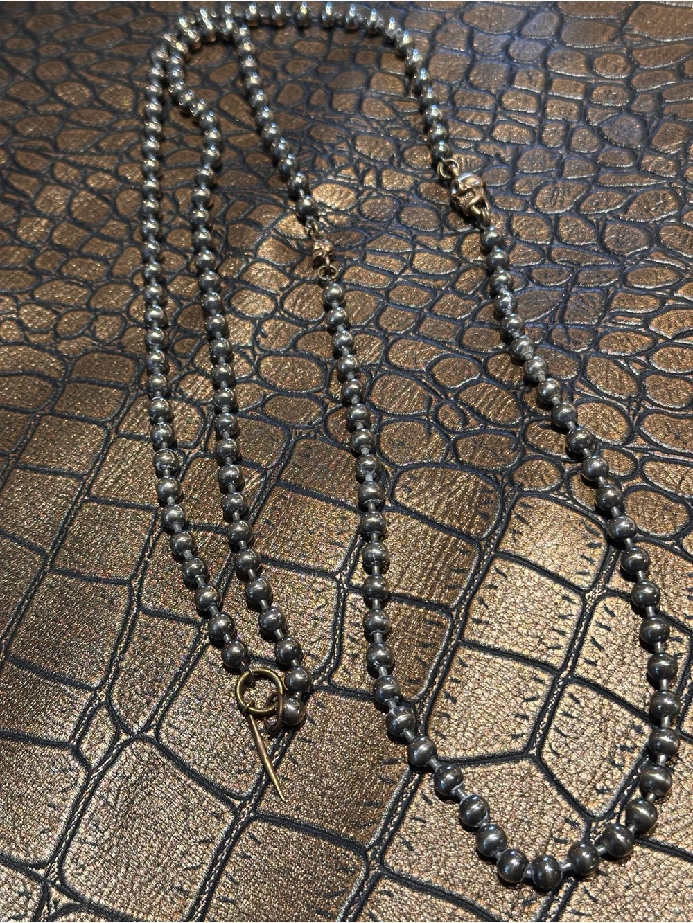 Sterling Silver Plated, Beaded Necklace - With 2 gold color Skulls.